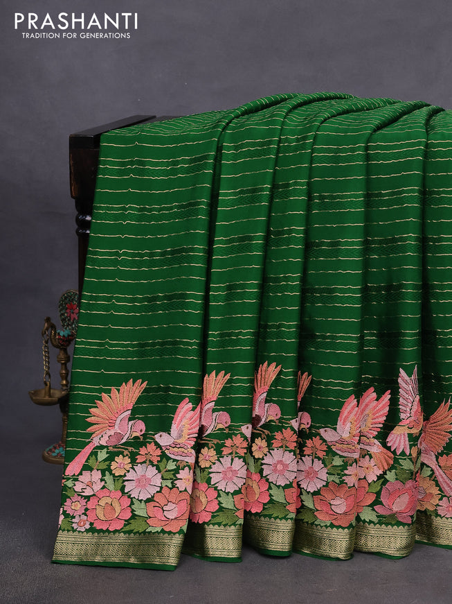 Pure crepe saree green with allover zari weaves & embroidery work and zari woven border