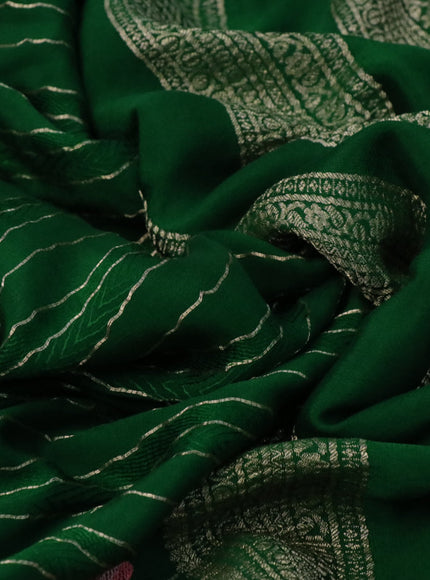 Pure crepe saree green with allover zari weaves & embroidery work and zari woven border