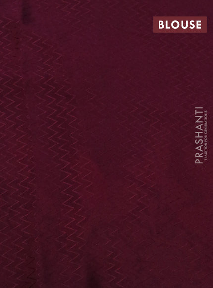 Pure crepe saree maroon with allover zari weaves & embroidery work and zari woven border