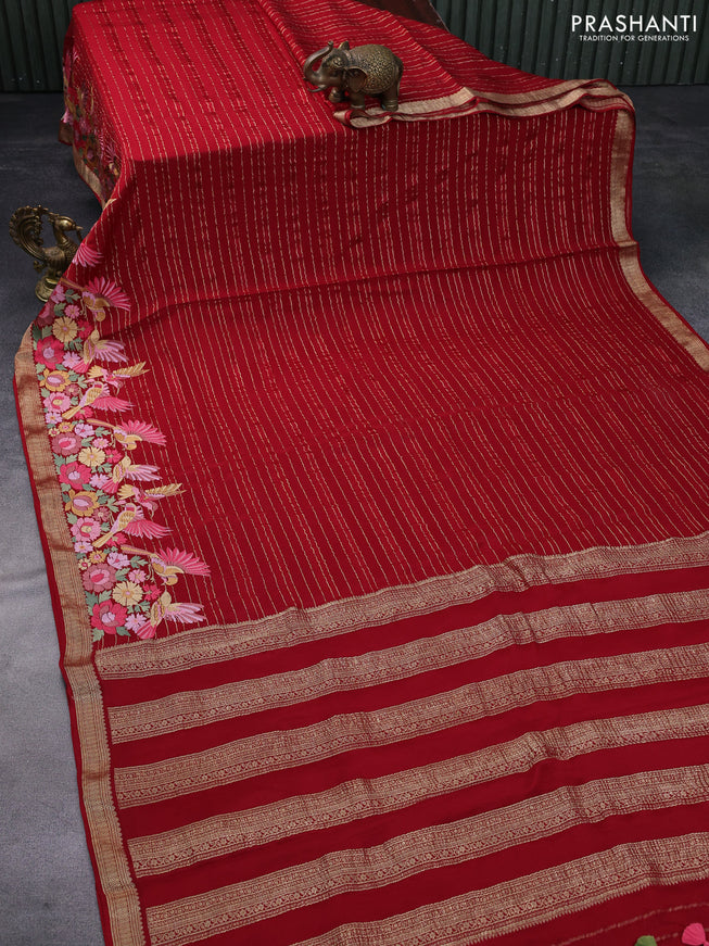 Pure crepe saree red with allover zari weaves & embroidery work and zari woven border