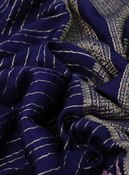 Pure crepe saree dark blue with allover zari weaves & embroidery work and zari woven border