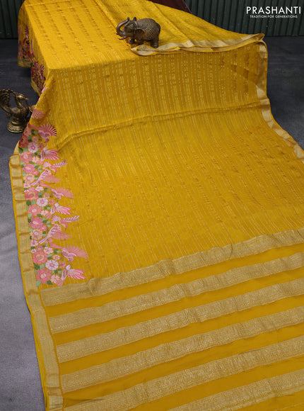 Pure crepe saree mustard yellow with allover zari weaves & embroidery work and zari woven border