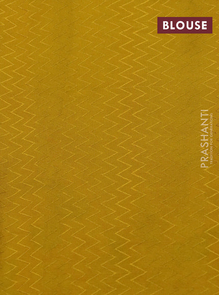 Pure crepe saree mustard yellow with allover zari weaves & embroidery work and zari woven border