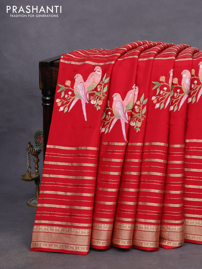 Pure crepe saree red with allover zari weaves & embroidery work and zari woven border