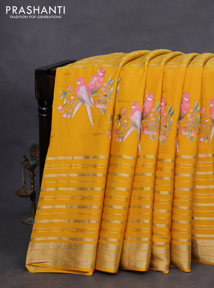 Pure crepe saree mustard yellow with allover zari weaves & embroidery work and zari woven border