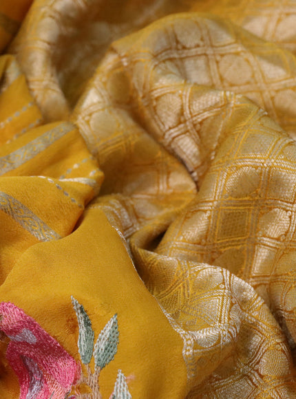 Pure crepe saree mustard yellow with allover zari weaves & embroidery work and zari woven border