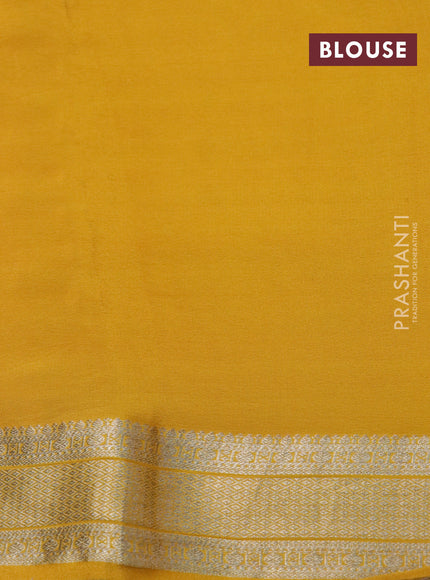 Pure crepe saree mustard yellow with allover zari weaves & embroidery work and zari woven border