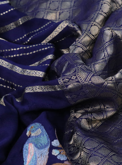 Pure crepe saree blue with allover zari weaves & embroidery work and zari woven border