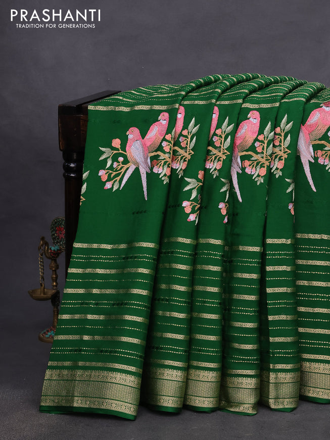 Pure crepe saree green with allover zari weaves & embroidery work and zari woven border