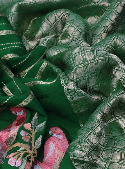 Pure crepe saree green with allover zari weaves & embroidery work and zari woven border