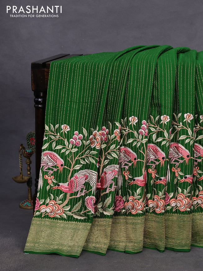 Pure crepe saree green with allover zari weaves & embroidery work and zari woven border