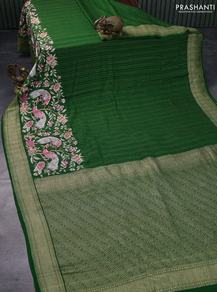 Pure crepe saree green with allover zari weaves & embroidery work and zari woven border