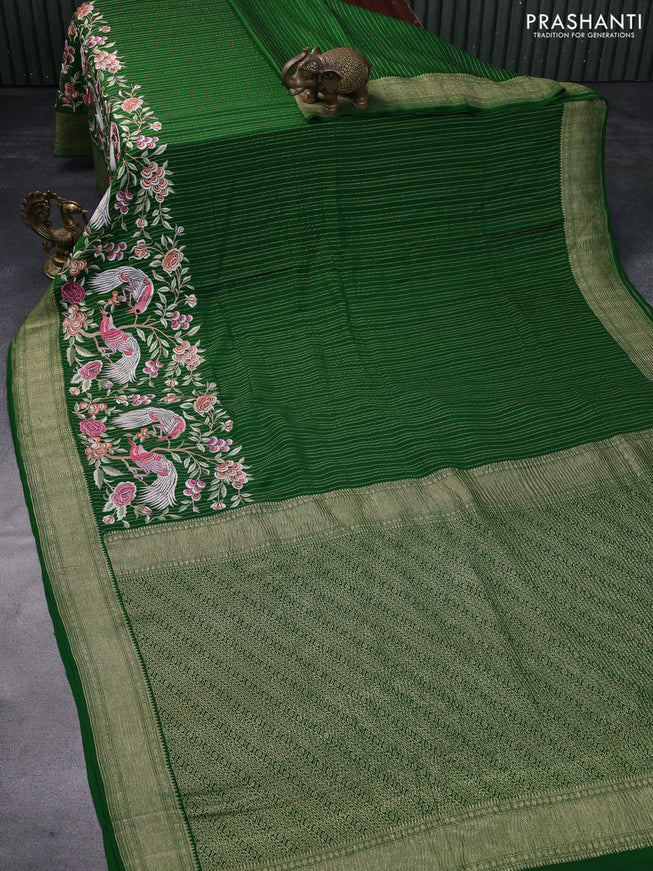 Pure crepe saree green with allover zari weaves & embroidery work and zari woven border