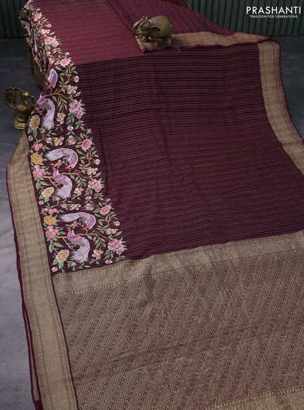 Pure crepe saree wine shade with allover zari weaves & embroidery work and zari woven border