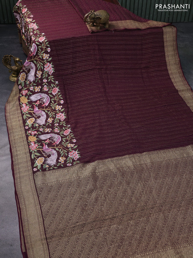 Pure crepe saree wine shade with allover zari weaves & embroidery work and zari woven border