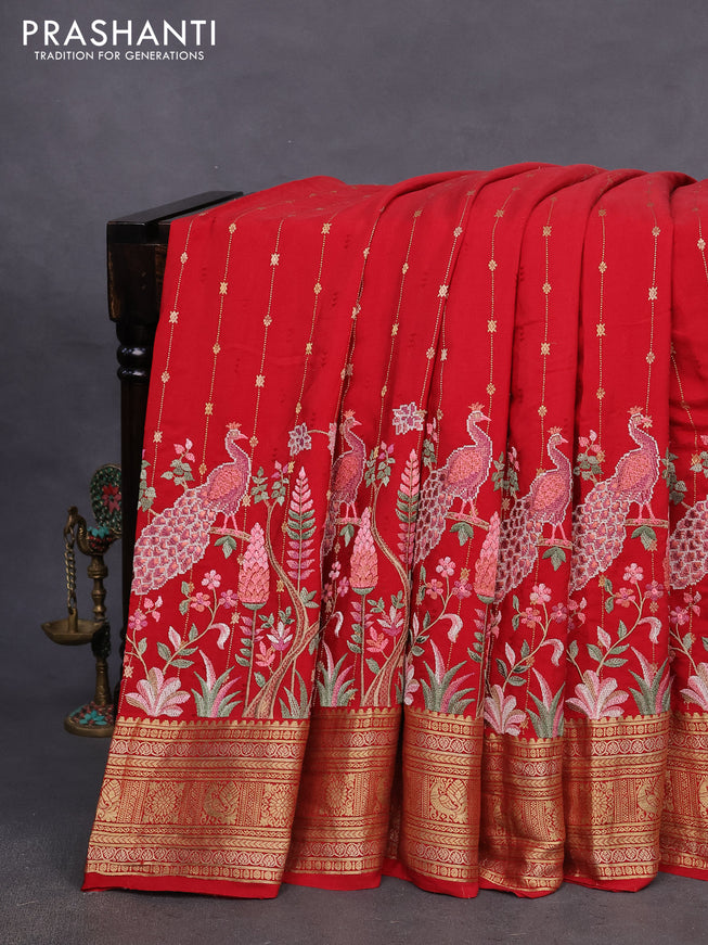 Pure crepe saree red with allover zari weaves & embroidery work and zari woven border