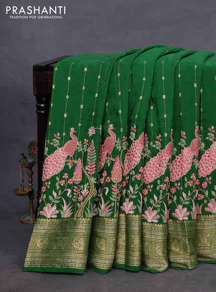 Pure crepe saree green with allover zari weaves & embroidery work and zari woven border