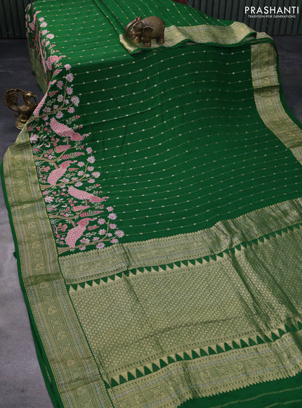 Pure crepe saree green with allover zari weaves & embroidery work and zari woven border