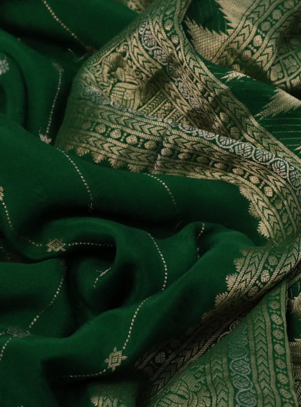 Pure crepe saree green with allover zari weaves & embroidery work and zari woven border