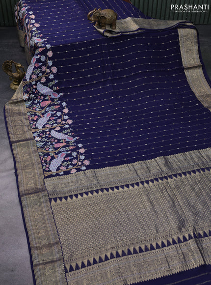 Pure crepe saree blue with allover zari weaves & embroidery work and zari woven border