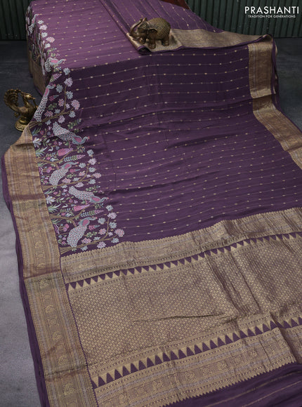 Pure crepe saree pastel jamun shade with allover zari weaves & embroidery work and zari woven border