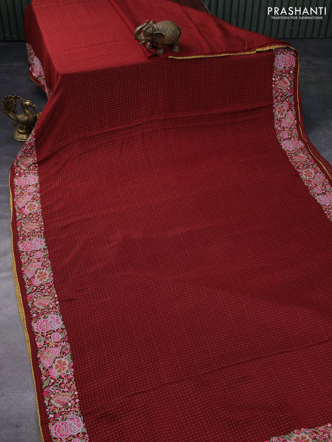 Pure crepe saree maroon shade with allover zari woven butta weaves and embroidery work border