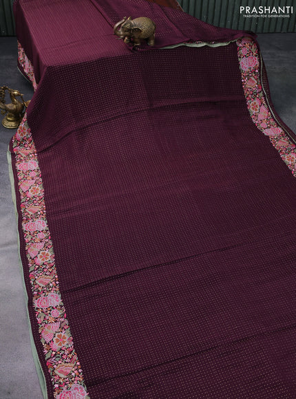 Pure crepe saree wine shade with allover zari woven butta weaves and embroidery work border