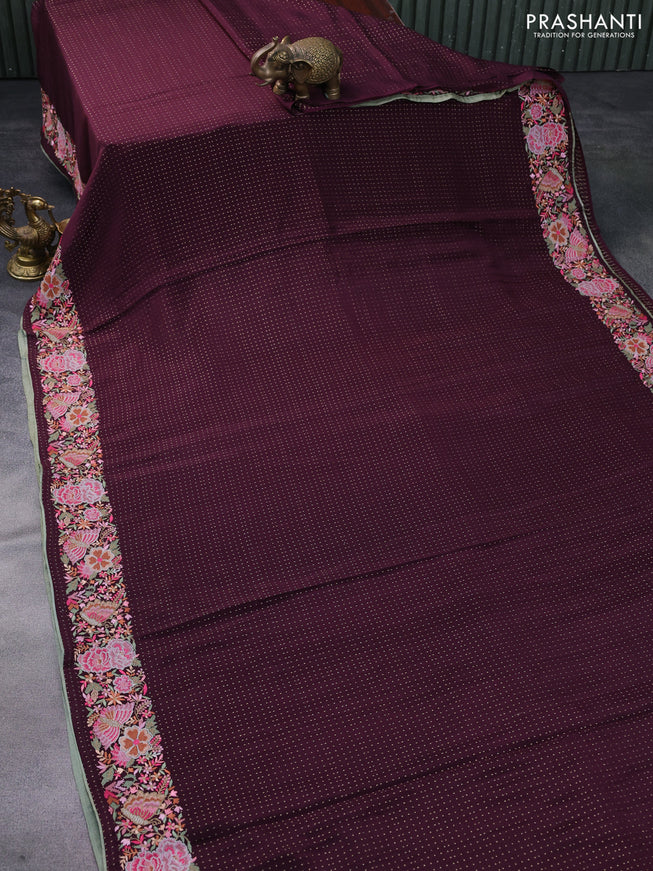 Pure crepe saree wine shade with allover zari woven butta weaves and embroidery work border