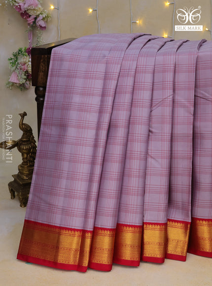 Pure kanchipuram silk saree pastel grey and pink with allover checked pattern and zari woven korvai border