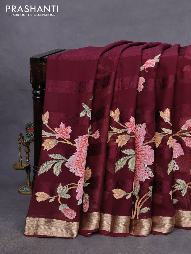 Pure georgette saree deep maroon with allover self emboss & floral embroidery work and zari woven border