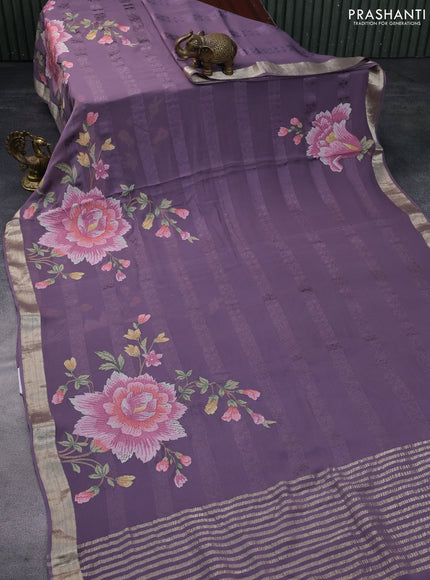 Pure georgette saree pastel lavender with allover self emboss & floral embroidery work and zari woven border