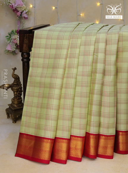 Pure kanchipuram silk saree pista green and pink with allover checked pattern and zari woven korvai border