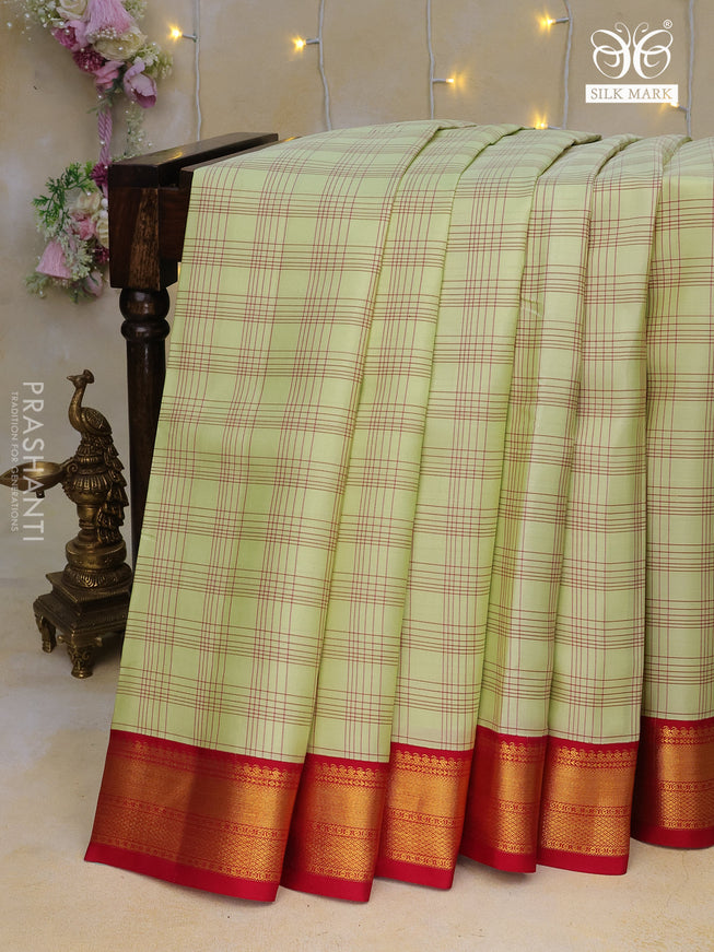 Pure kanchipuram silk saree pista green and pink with allover checked pattern and zari woven korvai border