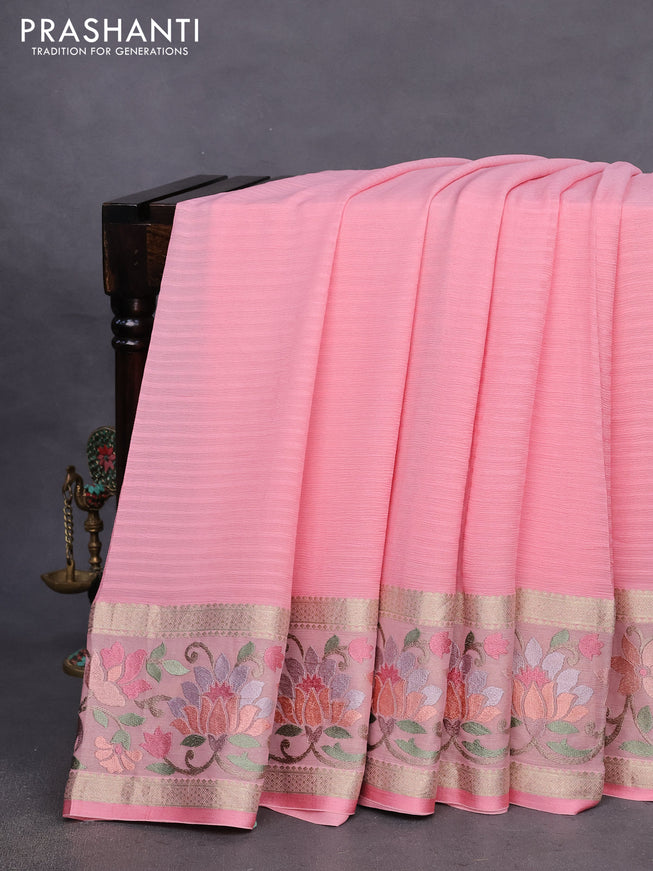 Pure georgette saree light pink with plain body and rettapet zari woven embroidery work border