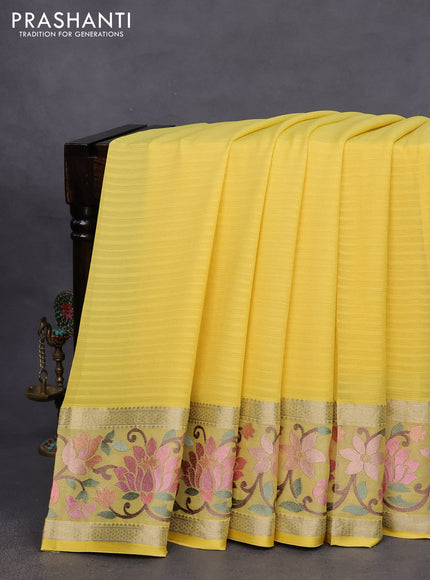 Pure georgette saree yellow with plain body and rettapet zari woven embroidery work border