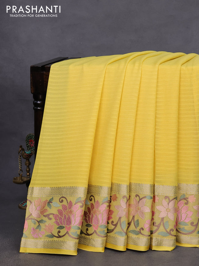 Pure georgette saree yellow with plain body and rettapet zari woven embroidery work border