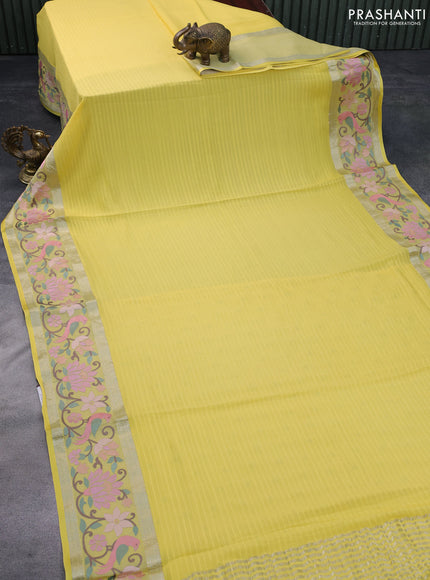 Pure georgette saree yellow with plain body and rettapet zari woven embroidery work border