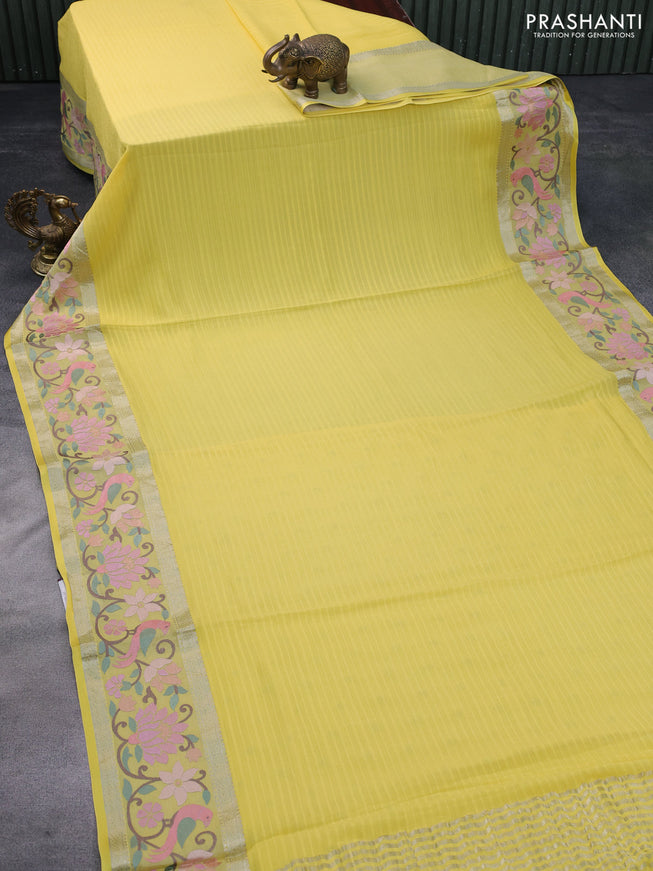 Pure georgette saree yellow with plain body and rettapet zari woven embroidery work border