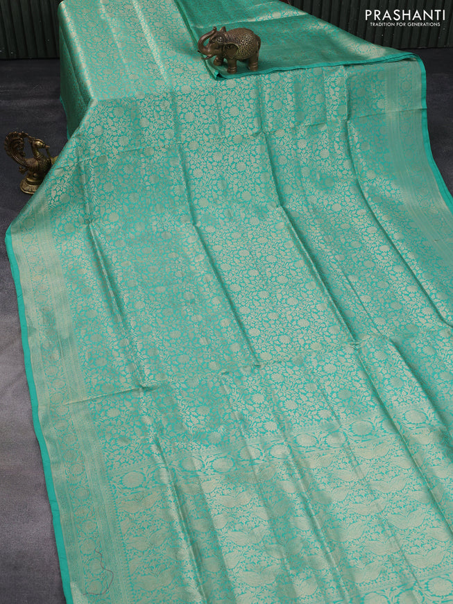 Banarasi uppada silk saree teal blue with allover zari woven brocade weaves and zari woven border