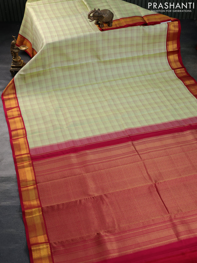 Pure kanchipuram silk saree pista green and pink with allover checked pattern and zari woven korvai border