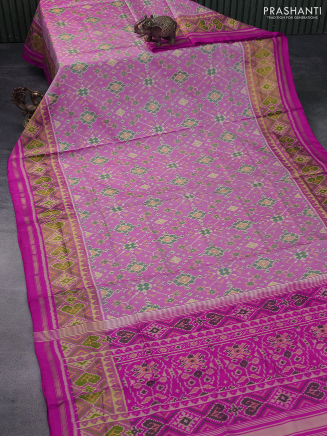 Rajkot patola silk saree light pink and pink with allover ikat weaves and zari woven ikat border