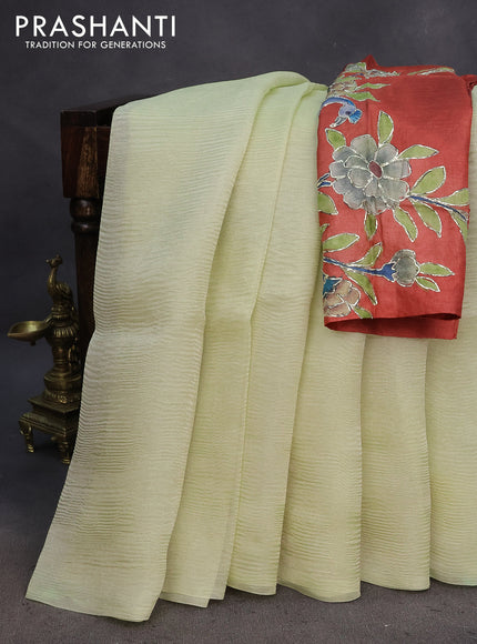 Organza crushed tissue silk saree pale yellow and rust shade with plain body in borderless style