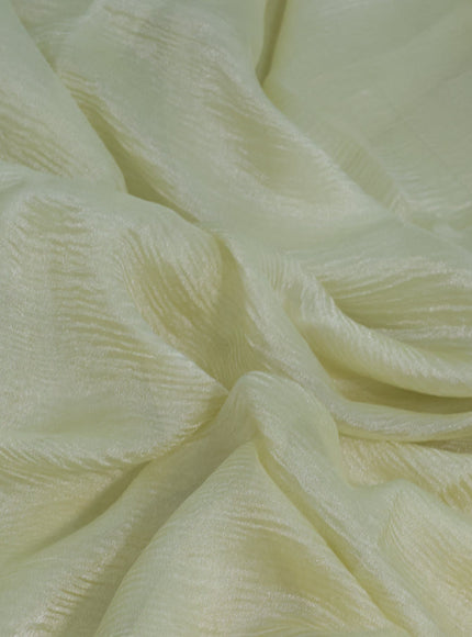 Organza crushed tissue silk saree pale yellow and rust shade with plain body in borderless style