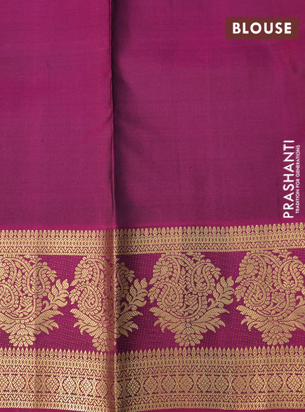 Pure kanchipuram silk saree green and purple with allover zari checked pattern and zari woven butta border