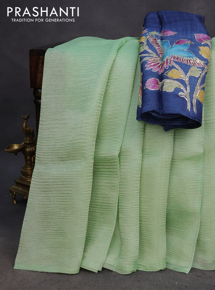 Organza crushed tissue silk saree pastel green and blue with plain body in borderless style