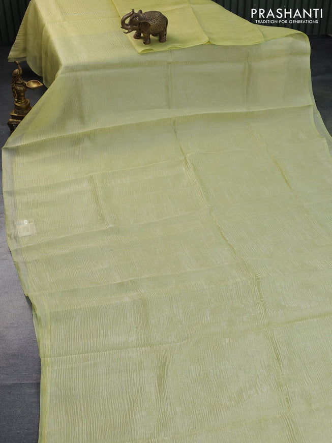 Organza crushed tissue silk saree yellow and teal blue with plain body in borderless style