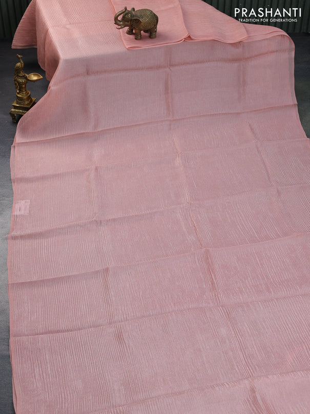 Organza crushed tissue silk saree pastel peach and peacock green with plain body in borderless style