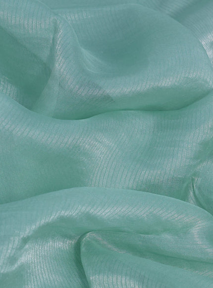 Organza crushed tissue silk saree pastel green shade and peacock blue with plain body in borderless style