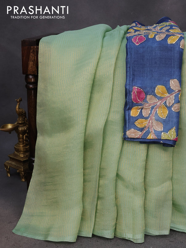 Organza crushed tissue silk saree pastel green with allover zari weaves in borderless style