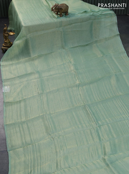 Organza crushed tissue silk saree pastel green with allover zari weaves in borderless style